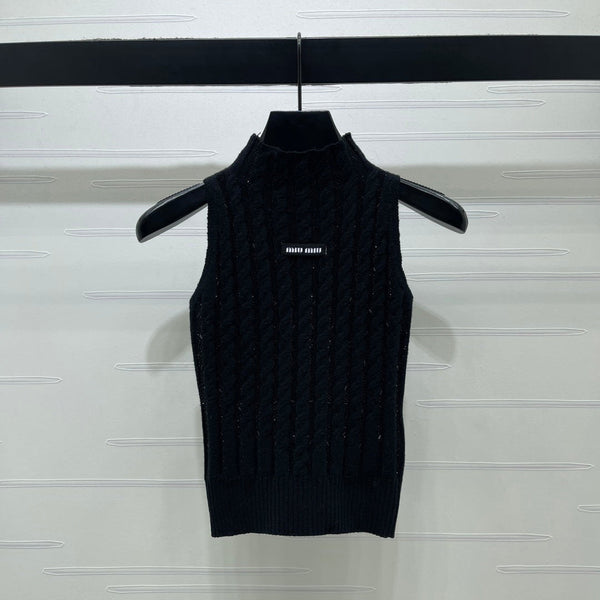 Miu Miu Gilet sans manches en laine noir avec câble torsadé épais 26 366350