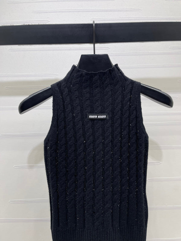 Miu Miu Gilet sans manches en laine noir avec câble torsadé épais 26 366350