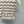 Chanel 2026 Wavy Stripe Knit Short-Sleeve Top Red in Knit Fabric 376036