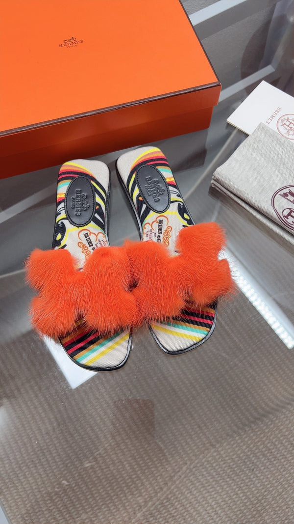 Sandales plates bout ouvert Hermes H-Style orange en fourrure de vison 739515