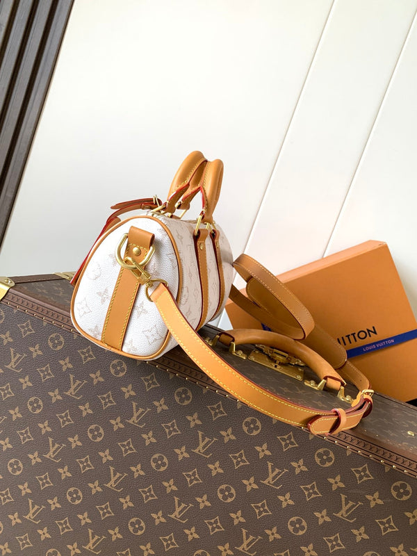 LV Keepall 25 Bandoulière Handbag White in Monogram coated Canvas 287218