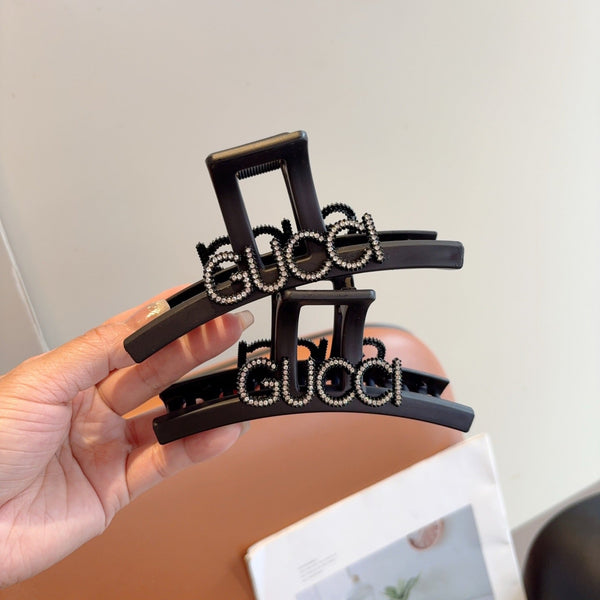 GG Crystal Logo Hair Claw Clip Black Resin 296129