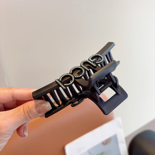 GG Crystal Logo Hair Claw Clip Black Resin 296129