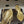 Alaia Thong Sandals Gold 3cm Patent Leather 835285