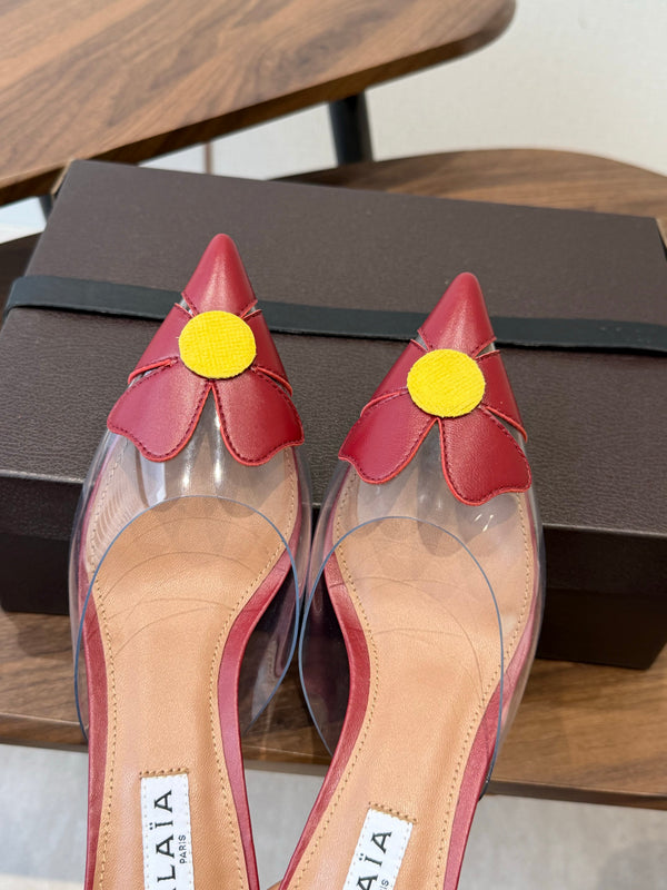 Alaia Round Flower Mules 55mm Cowhide Clear PVC 889940