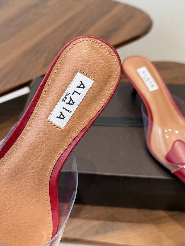 Alaia Round Flower Mules 55mm Cowhide Clear PVC 889940