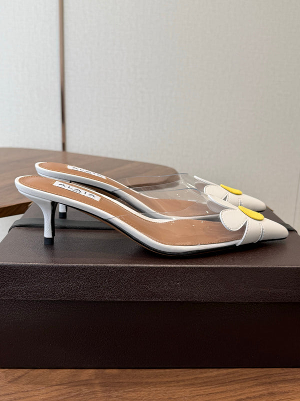 Alaia Daisy Mules 55mm Cowhide Clear PVC 889945