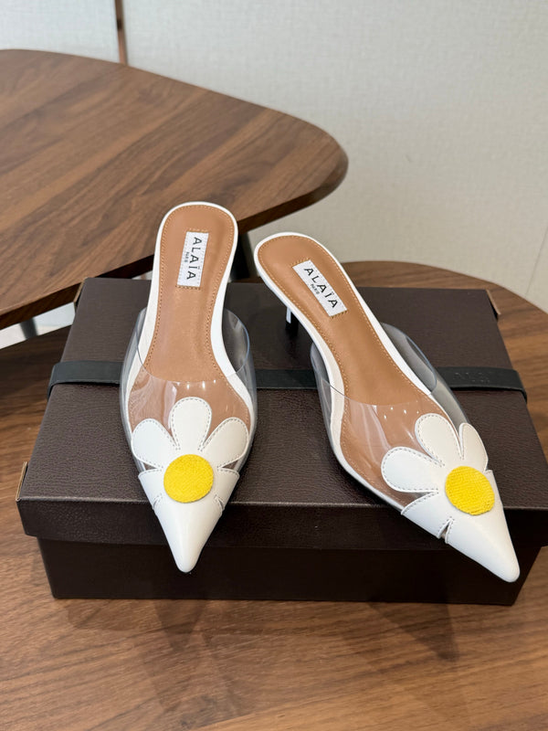 Alaia Daisy Mules 55mm Cowhide Clear PVC 889945