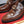 Mocassino da uomo GG in pelle di vacchetta goffrata marrone 484786