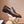 Mocassino da uomo GG in pelle di vacchetta goffrata marrone 484786