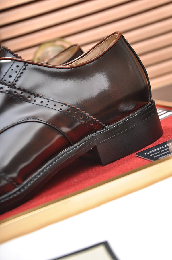 Scarpa elegante da uomo GG in pelle di vacchetta marrone 499520