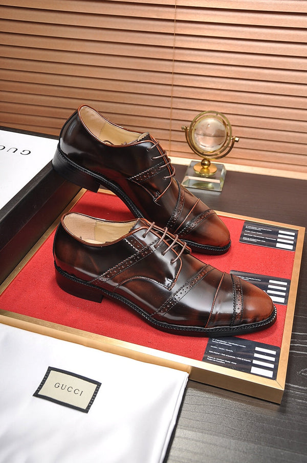 Scarpa elegante da uomo GG in pelle di vacchetta marrone 499520