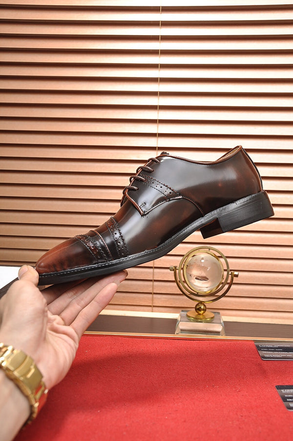 Scarpa elegante da uomo GG in pelle di vacchetta marrone 499520