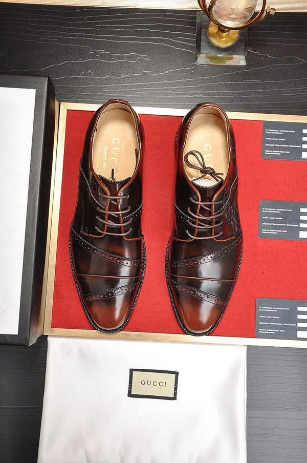 Scarpa elegante da uomo GG in pelle di vacchetta marrone 499520