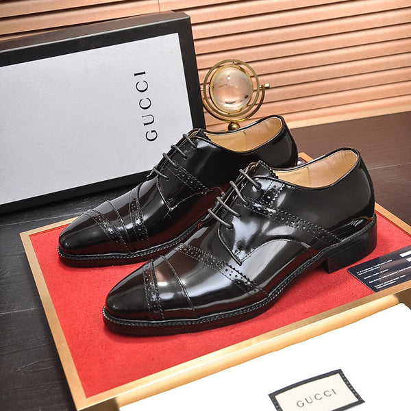 Scarpa elegante da uomo GG in pelle di vacchetta nera 499521