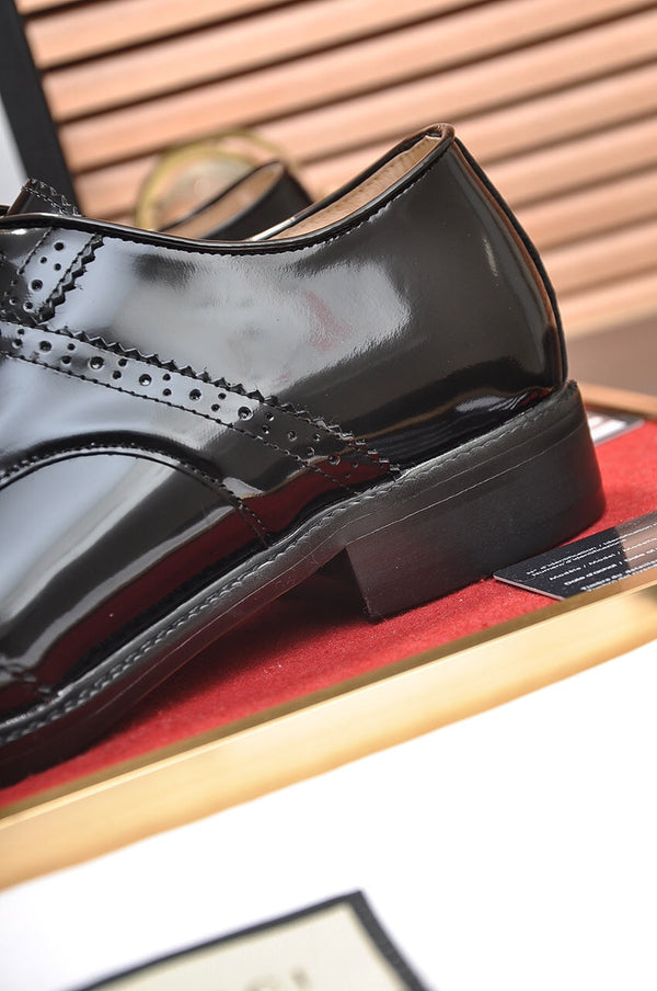 Scarpa elegante da uomo GG in pelle di vacchetta nera 499521