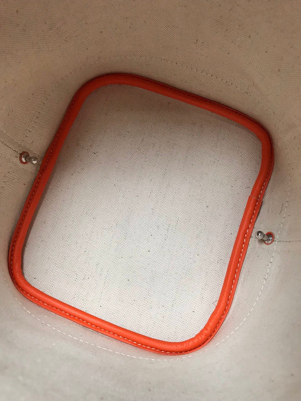 BORSA A SECCHIELLO PETIT FLOT 22 IN TELA GOYARDINE ARANCIO E PROFILI IN AGNELLO