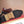 Mocassino da uomo GG in pelle di vacchetta goffrata marrone 526094