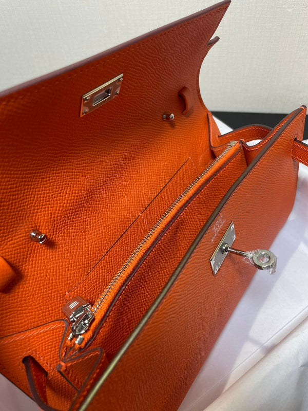 kelly woc 20.5 arancione epsom hardware argento