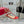 SANDALO INFRADITO ROCKSTUD CON CINTURINI IN PELLE DI VITELLO ROSSO CILIEGIA
