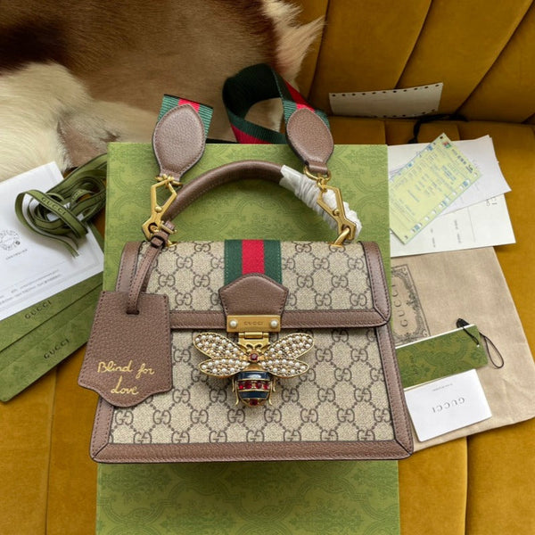 BORSA A MANO GG MINI 25 IN TELA BEIGE E PELLE DI VITELLO MARRONE