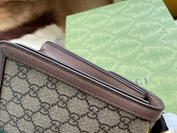 BORSA A MANO GG MINI 25 IN TELA BEIGE E PELLE DI VITELLO MARRONE