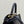 PEEKABOO ISEEU 27 IN BLACK SMOOTH CALFSKIN WITH WOVEN TRIM GOLD HARDWARE