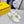 FENDI GRAPHY LOGO LETTERING SLIDES IN WHITE LAMBSKIN WITH GOLD HARDWARE