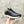 HM EMBOSSED ICON SNEAKER BLACK CALFSKIN