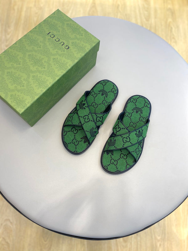 Sandali da uomo GG x Adidas Slide in tela verde 558905