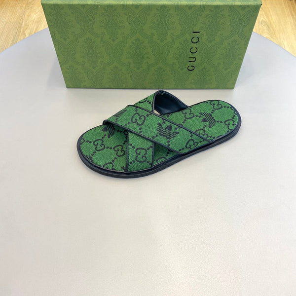 Sandali da uomo GG x Adidas Slide in tela verde 558905