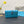 CARO SLIM POUCH 21 BAG IN SKY BLUE CALFSKIN