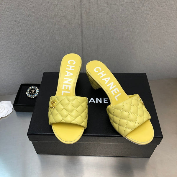 SANDALI TRAPUNTATI A ROMBI DA 6 CM IN PELLE DI AGNELLO GIALLO BRILLANTE