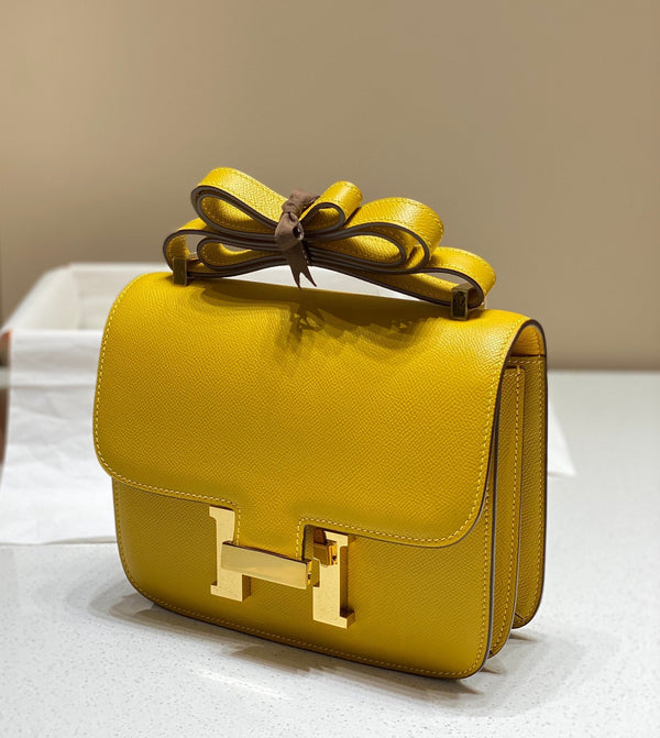 constance 24 in pelle gialla Epsom con finiture dorate