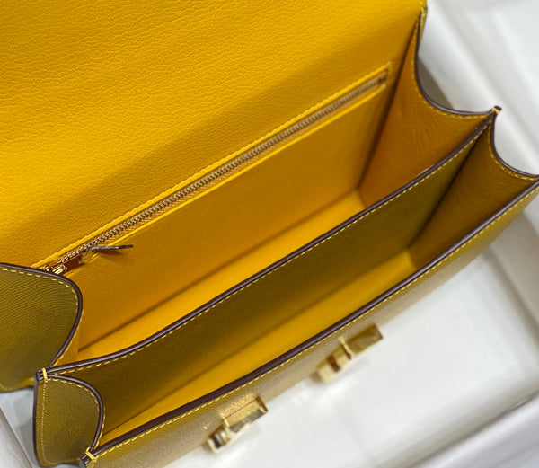 constance 24 in pelle gialla Epsom con finiture dorate