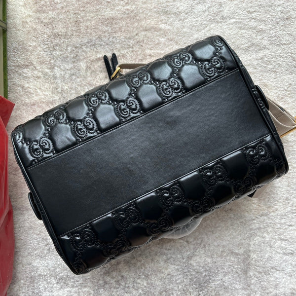BORSA A MANO MATELASSÉ 31 IN PELLE DI VITELLO GOFFRATA NERA E FERRAMENTA ORO