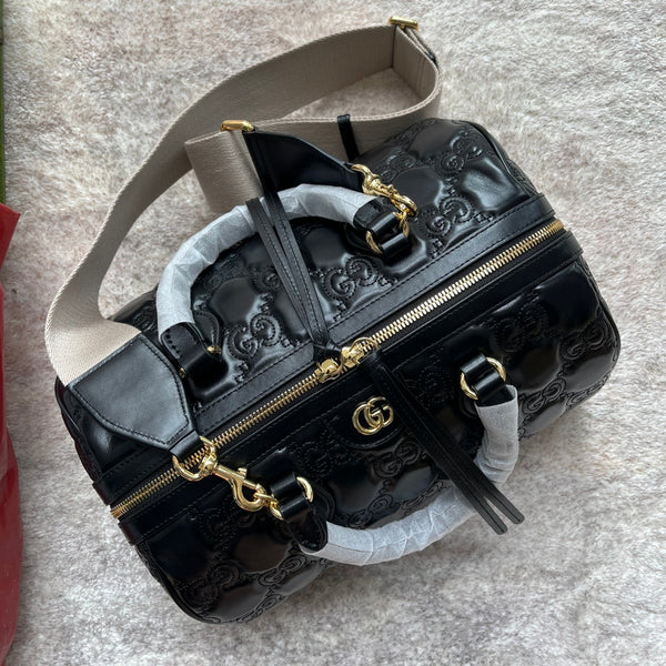 BORSA A MANO MATELASSÉ 31 IN PELLE DI VITELLO GOFFRATA NERA E FERRAMENTA ORO