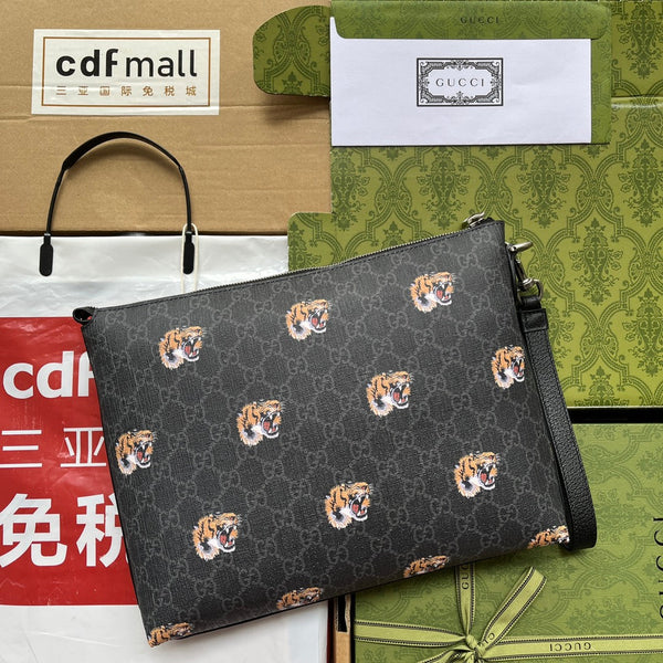 POCHETTE CON STAMPA TIGRE 30 IN TELA MONOGRAMMA NERA