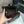 borsa a patta mini 20 cm in pelle di agnello nera con finiture dorate 