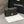 borsa a patta mini 20 cm in pelle di agnello nera con finiture dorate 