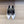 OPYUM BLACK HEEL PUMPS IN WHITE SMOOTH LAMBSKIN