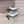 DÉCOLLETÉ SLINGBACK CON TACCO NERO OPYUM IN PELLE DI AGNELLO LISCIA BIANCA