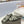 SL TRIBUTE SLIPPERS GLOSSY SAGE CALFSKIN