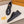LV RIVOLI SNEAKER BLACK MINI MONOGRAM-EMBOSSED CALFSKIN