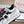 VT 2025 Garavani Sneakers White Black Cowhide 546999
