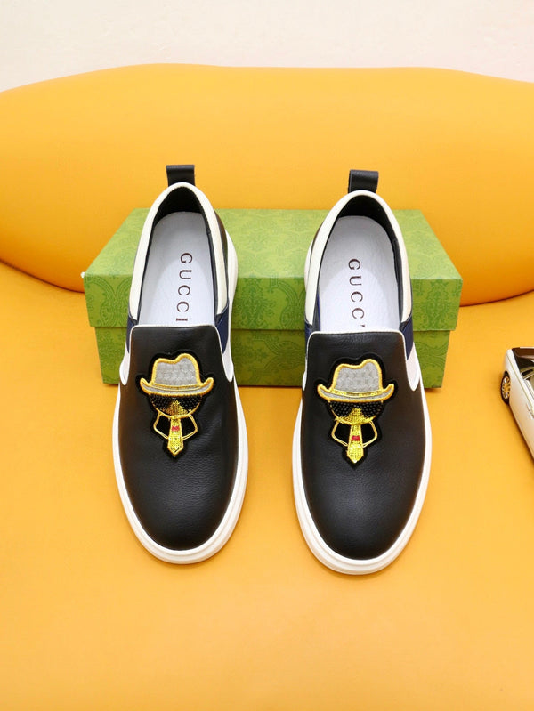 Mocassini slip-on da uomo GG in pelle di vacchetta bianca e nera 660094