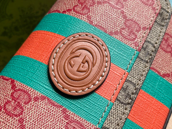 BORSA A MANO GG MINI 13 IN TELA ROSA CHIARO E BEIGE