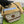 BORSA A MANO GG MINI 13 IN TELA BEIGE E PELLE DI VITELLO MARRONE