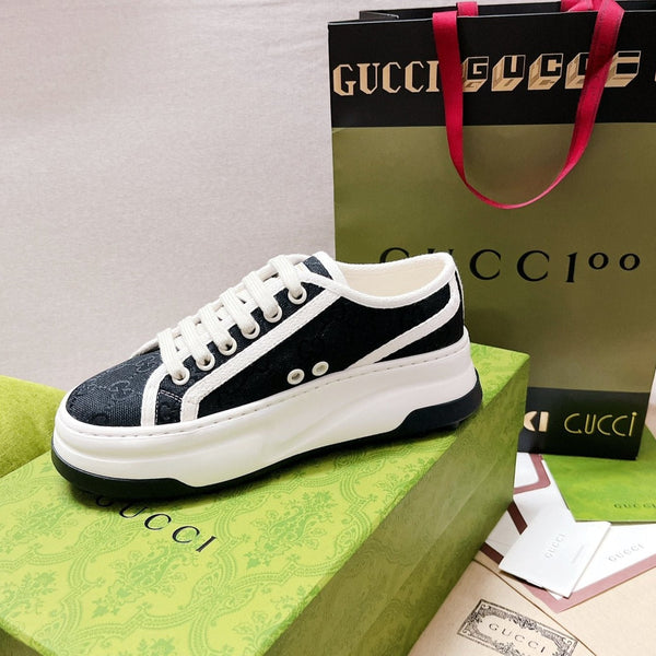 Sneakers stringate in tela GG nere e bianche