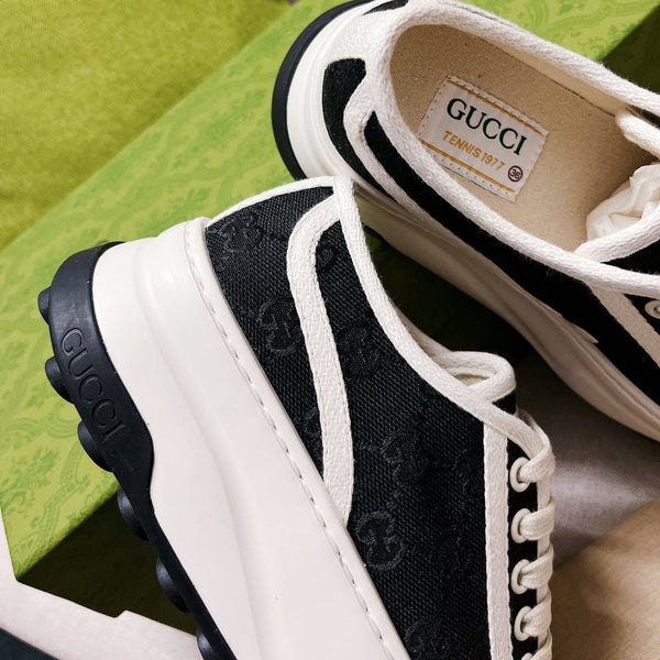 Sneakers stringate in tela GG nere e bianche